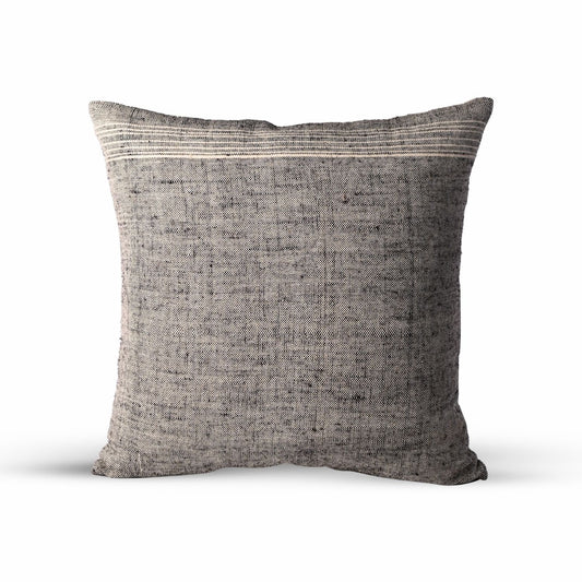 Handwoven cotton and wool throw pillow in a soft smoke gray hue, 20x20 square, featuring subtle striped detailing for a timeless, modern aesthetic.