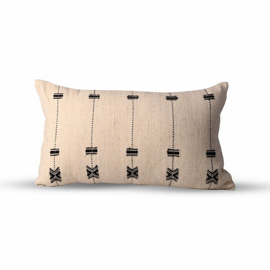 Handcrafted throw pillow in a soft pearl hue, 12x20 lumbar, featuring a refined cotton and wool texture for a timeless and elegant accent.